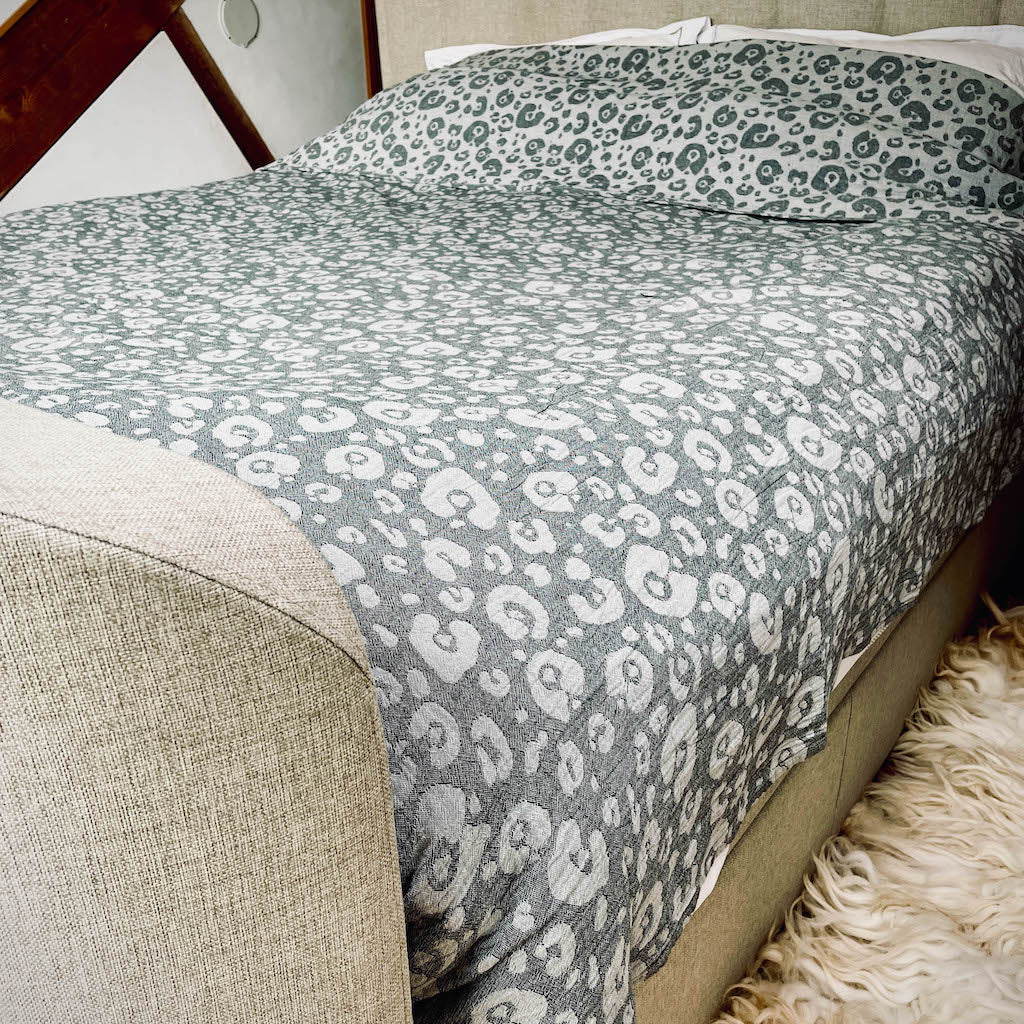 leopard print king size bedspread shown on single bed