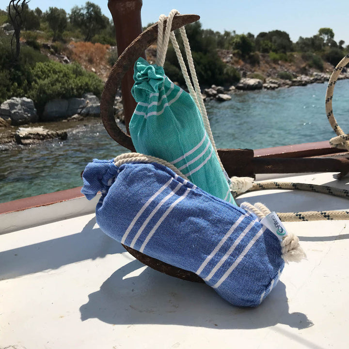 perim hammam towels in carry pouch on ship's deck